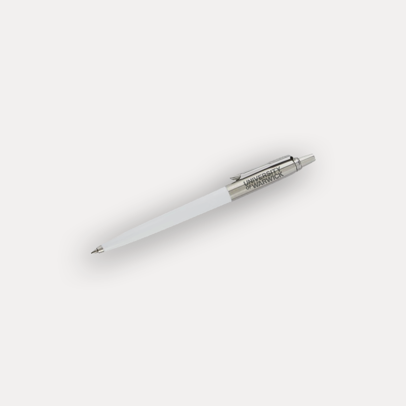 A white retractable ballpoint pen with a silver metal clip and tip, featuring the text 'UNIVERSITY OF WARWICK' engraved on the clip, shown on a light grey background.