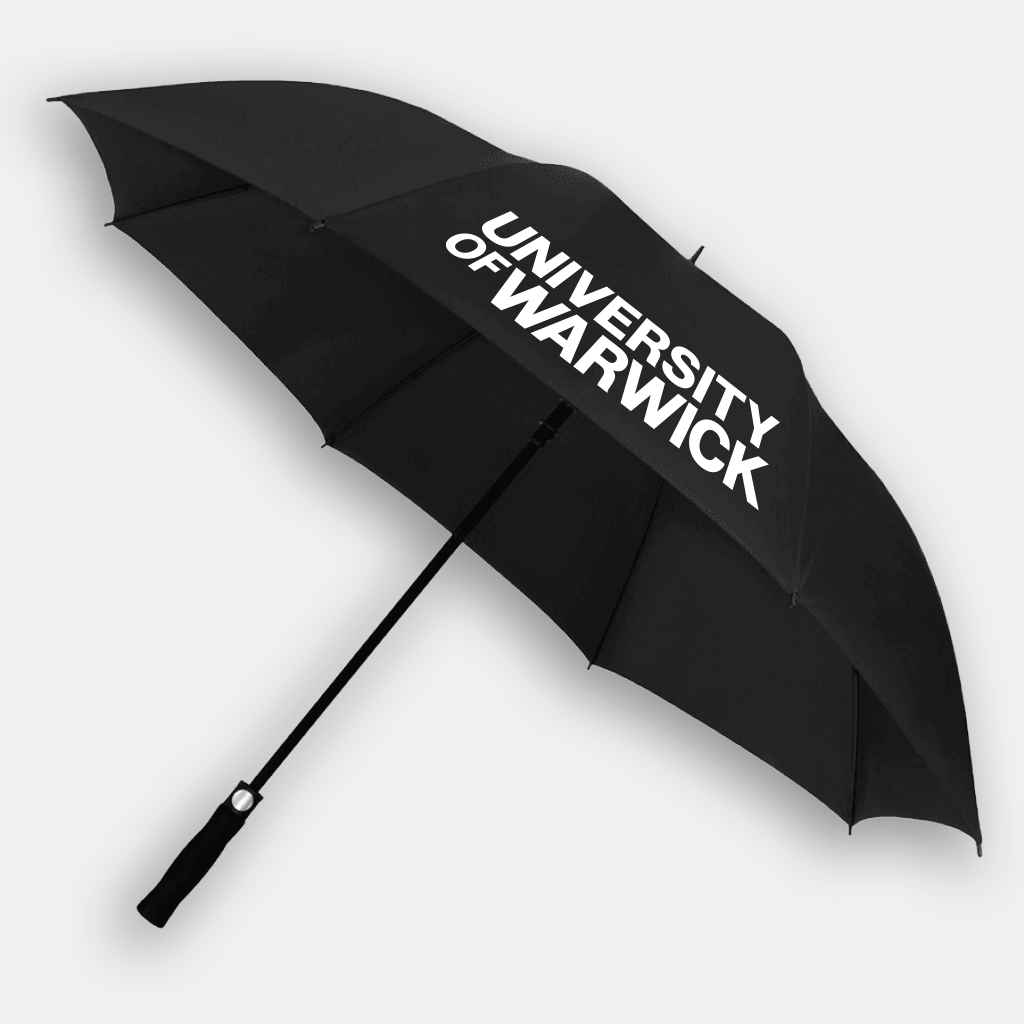 A black open umbrella with the words 'UNIVERSITY OF WARWICK' printed in bold white letters on the canopy, shown against a light gray background.