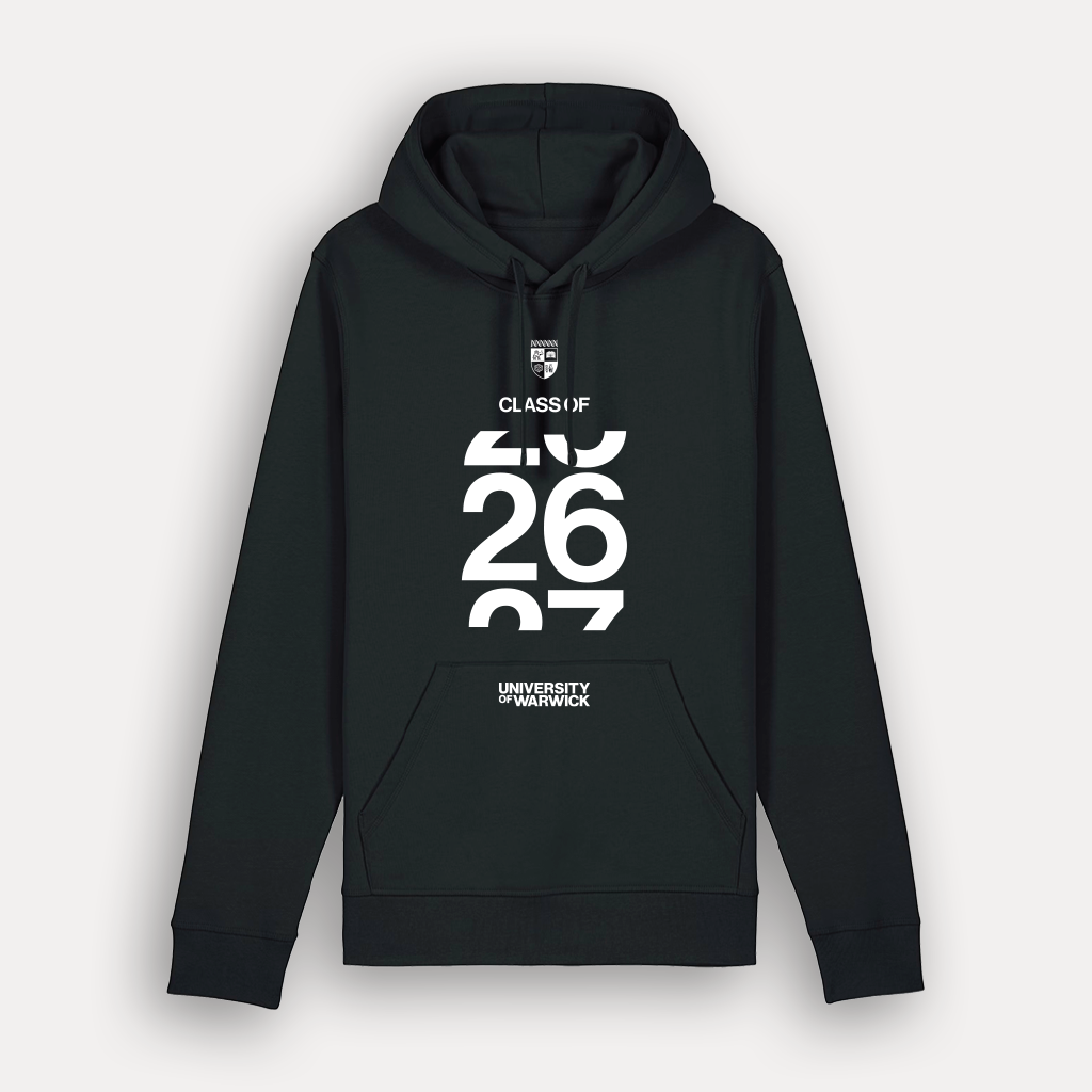 A black pullover hoodie with white printed graphics on the front, including a small crest logo, the text 'CLASS OF', large stylised numbers '26 27', and 'UNIVERSITY OF WARWICK' at the bottom. Shown on a light grey background.