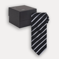 A black necktie with diagonal silver stripes, displayed next to its black presentation box on a light gray background.
