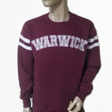 Warwick college sweatshirts in burgundy with Warwick embroidered in white on the front and two white stripes on each upper arm