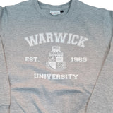 Warwick unisex sweatshirt in grey with Warwick University, Warwick crest and est. 1965 printed on the front in white